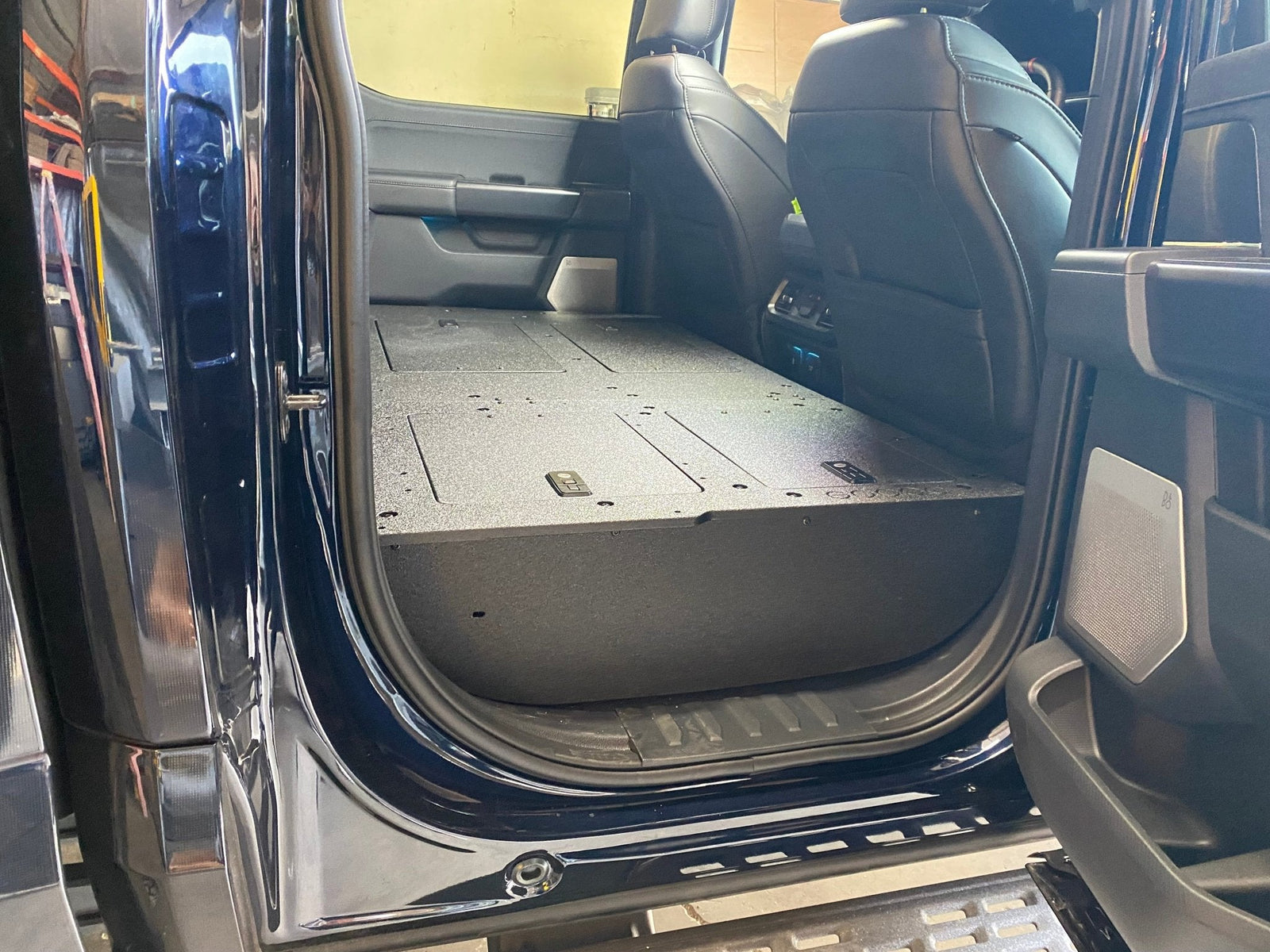 Ford Super Duty Ford - F250-F550 - 2023-Present - 5th Gen. Crew Cab - Second Row Seat Delete Plate System with Factory B&O Subwoofer Center Wall with Exterior Port