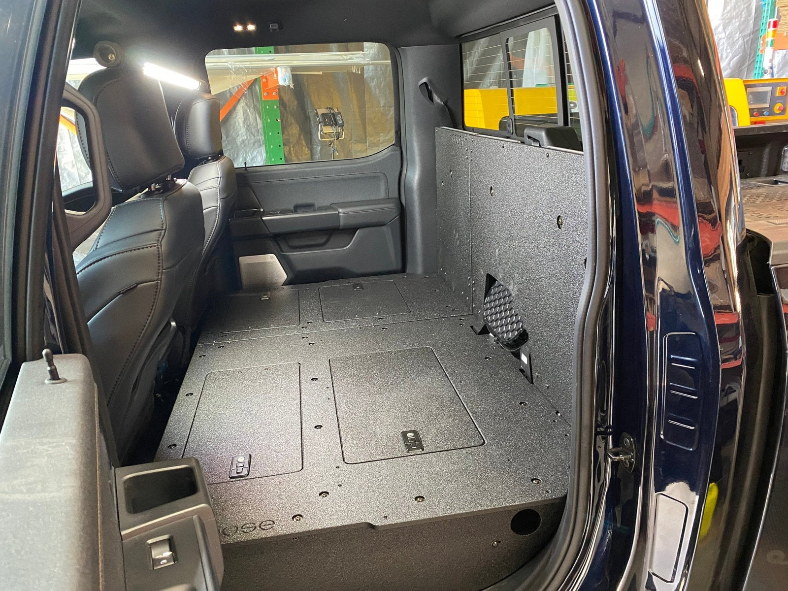Ford Super Duty Ford - F250-F550 - 2023-Present - 5th Gen. Crew Cab - Second Row Seat Delete Plate System with Factory B&O Subwoofer Center Wall with Exterior Port